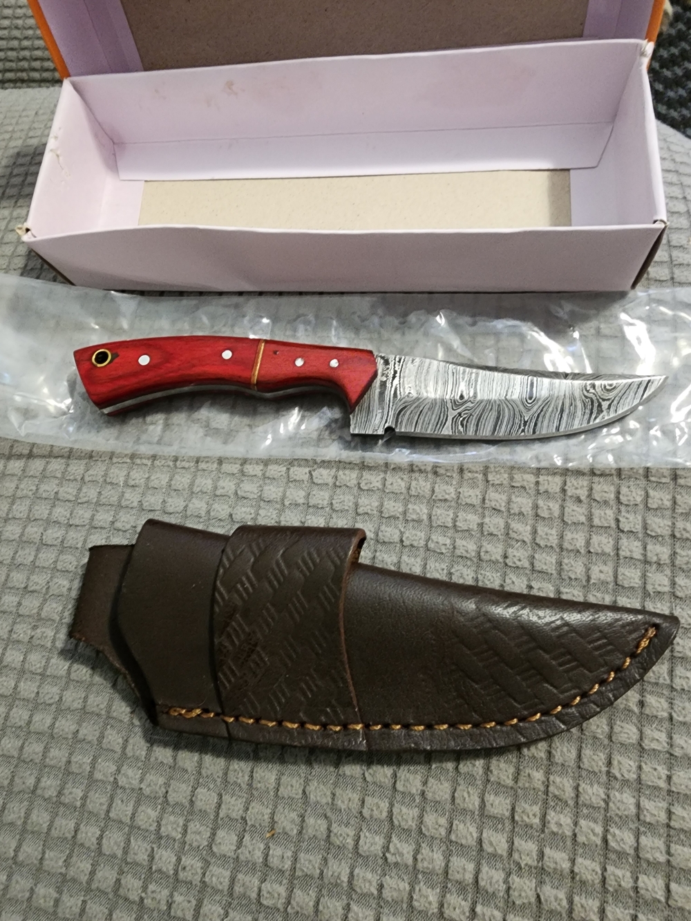 Red Handle Damascus-Style Hunting Knife with Leather Sheath